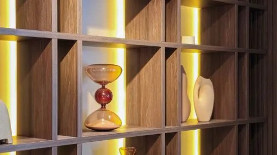 Dimensões e iluminação criando um móvel único para a identidade visual do espaço.